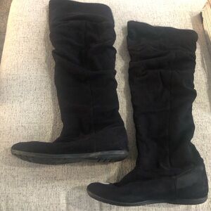 Woman’s black boots